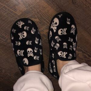Black Skull Pattern Slip on shoes well worn